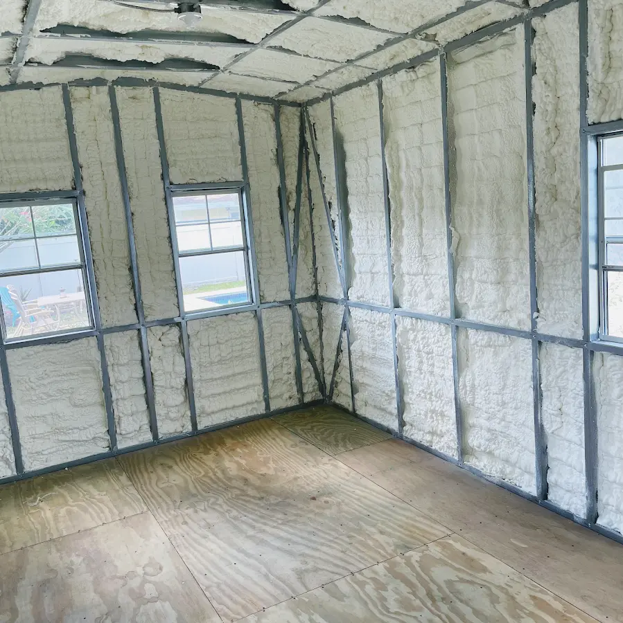 Closed-cell spray foam insulation applied to wall cavities in a residential project in Macomb